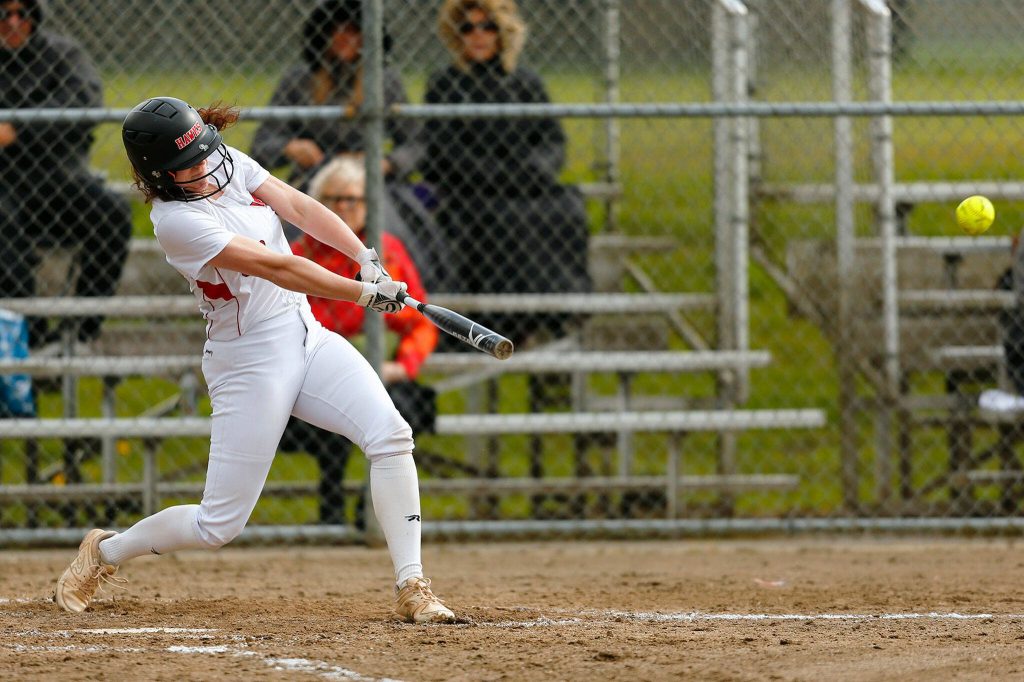 Mountlake Terrace catcher Cameron Dunn smacks a three-run home run over the fence during a game against Archbishop Murphy on Tuesday, April 18, 2023, at her team’s home field in Mountlake Terrace, Washington. (Ryan Berry / The Herald)