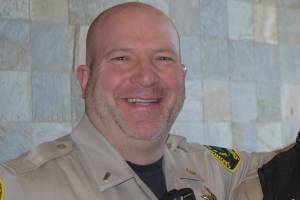 Mike Martin poses for a photo at the Snohomish County Sheriff’s Office's annual award ceremony on March 16, 2023. (Snohomish County Sheriff's Office)