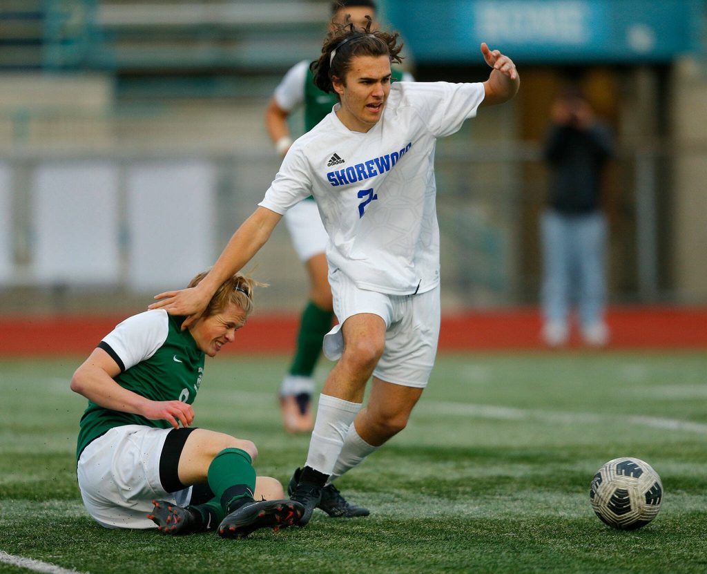Shorewood defenseman Jafeth Ramirez Cerezo comes away with the ball against Edmonds-Woodway on Friday, April 21, 2023, at Edmonds Stadium in Edmonds, Washington. (Ryan Berry / The Herald)