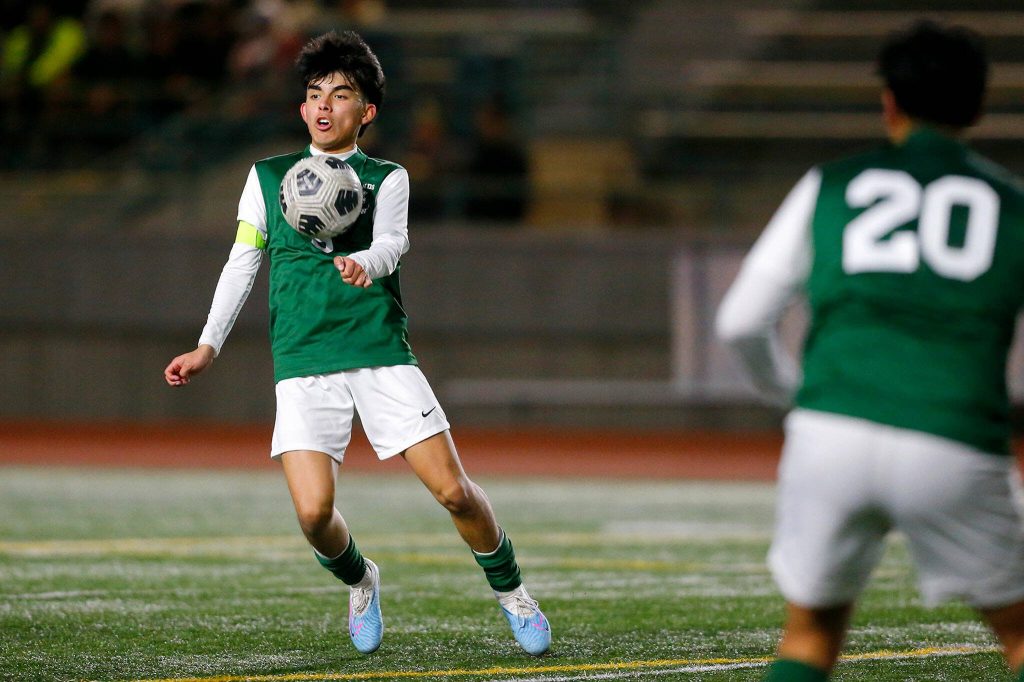 Edmonds-Woodway senior midfielder Edgar Cabrera takes control of the ball against Shorewood on Friday, April 21, 2023, at Edmonds Stadium in Edmonds, Washington. (Ryan Berry / The Herald)