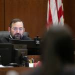 Superior Court Judge Miguel M. Duran speaks with the prosecution during the first day of the trial of Shayne Baker on Monday, April 24, 2023, at Snohomish County Superior Court in Everett, Washington. (Ryan Berry / The Herald)