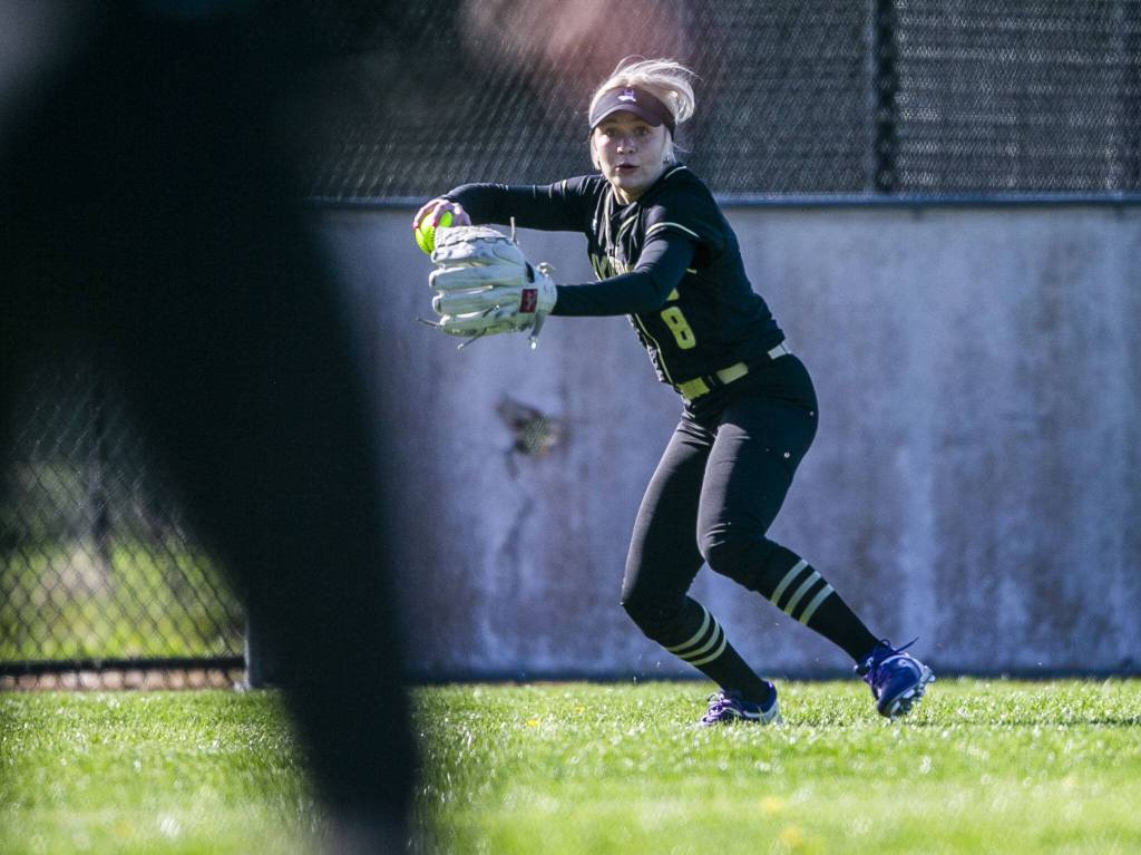 Lake Stevens Zoe Hopkins fields a ball during the game against Glacier Peak on Tuesday, April 25, 2023 in Lake Stevens, Washington. (Olivia Vanni / The Herald)