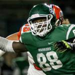 Edmonds-Woodways Ali Gaye rushes the passer during a game against Lakes on November 4, 2016, in Edmonds. (Kevin Clark / The Herald)