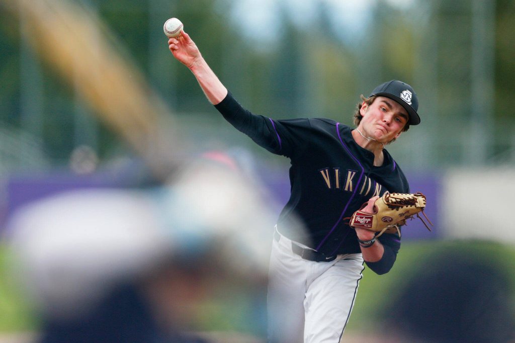 Lake Stevens Wyatt Queen delivers a pitch in a win over Jackson on Wednesday, April 26, 2023, in Lake Stevens, Washington. (Ryan Berry / The Herald)
