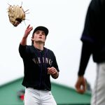 Lake Stevens Wyatt Queen tosses his mitt after recording the final out in a win over Jackson on Wednesday, April 26, 2023, in Lake Stevens, Washington. (Ryan Berry / The Herald)