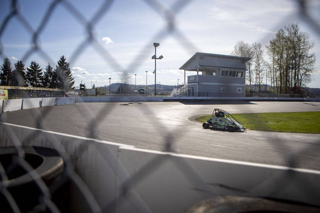 Aiden Stone, 8, runs laps at Evergreen Fairgrounds in Monroe, Washington on Tuesday, April 25, 2023. (Annie Barker / The Herald)