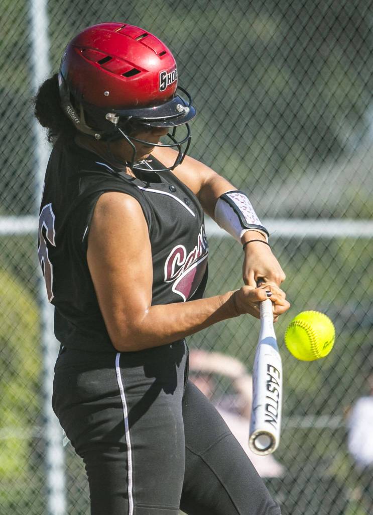 Cascades Jaidyn Wilson gets a hit during the game against Snohomish on Friday, April 28, 2023 in Snohomish, Washington. (Olivia Vanni / The Herald)