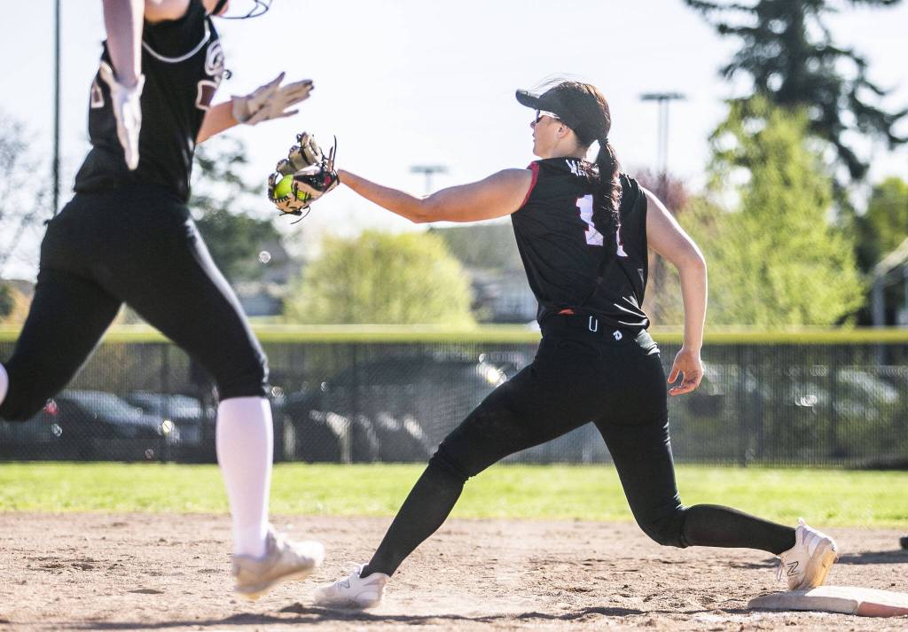 Snohomishs Evy Massena gets an out at first base during the game against Cascade on Friday, April 28, 2023 in Snohomish, Washington. (Olivia Vanni / The Herald)