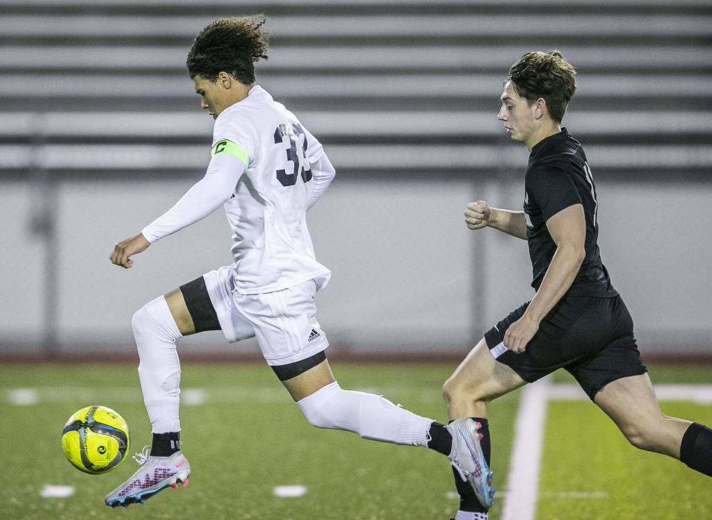 Glacier Peaks Azavier Coppin almost gets a breakaway during the game against Jackson on Friday, April 28, 2023 in Snohomish, Washington. (Olivia Vanni / The Herald)
