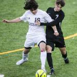 Glacier Peaks Dylan Bryant and Jacksons Vitaliy Nagomyy fights for the ball during the game on Friday, April 28, 2023 in Snohomish, Washington. (Olivia Vanni / The Herald)