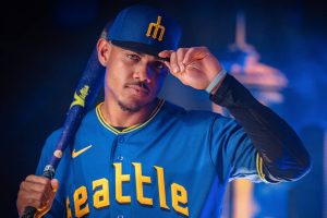 Julio Rodriguez poses in the Seattle Mariners' new City Connect jerseys. (Seattle Mariners photo)