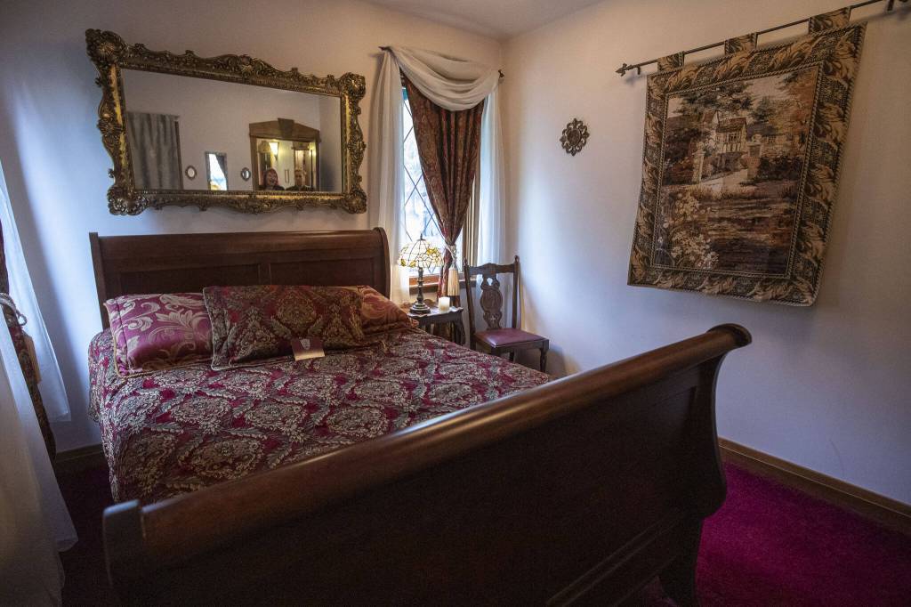 The Queen Suite, one of four bedrooms, at High Rock Castle in Monroe. (Annie Barker / The Herald)