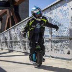 Eric Rowe, 48, rides on his electric unicycle near the Everett Marina in Everett, Washington, on Sunday, May 7, 2023. (Annie Barker / The Herald)