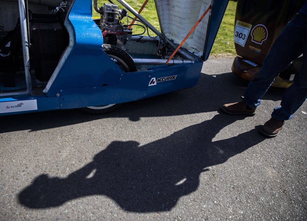 Hunter Mattson talks about adjustments made to the urban concept diesel cars engine area on Thursday, April 27, 2023 in Granite Falls, Washington. (Olivia Vanni / The Herald)