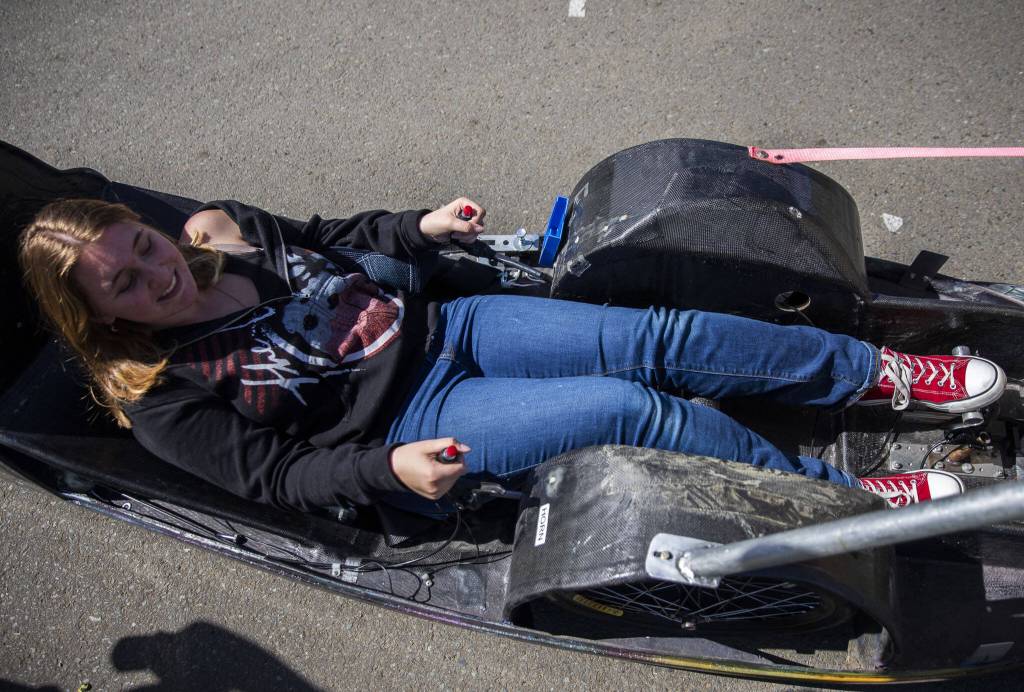 Jayden England demonstrates how to drive the battery electric prototype car on Thursday, April 27, 2023 in Granite Falls, Washington. (Olivia Vanni / The Herald)