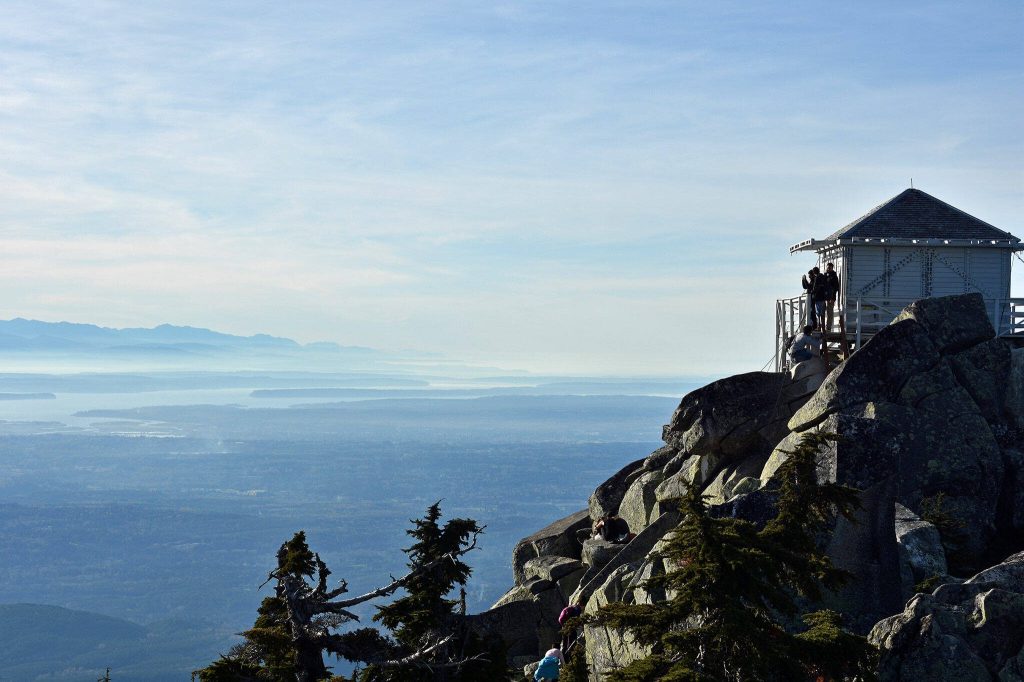 The Mount Pilchuck fire lookout offers sweeping 360-degree views of Puget Sound, the Olympic Mountains and the North Cascades. (Caleb Hutton / The Herald)