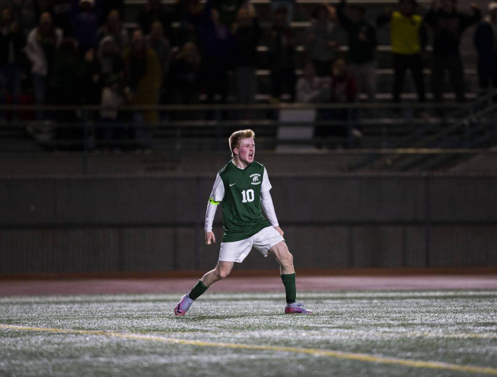 Edmonds-Woodways Ben Hanson reacts to his goal during the game against Everett on Monday, May 1, 2023 in Edmonds, Washington. (Olivia Vanni / The Herald)