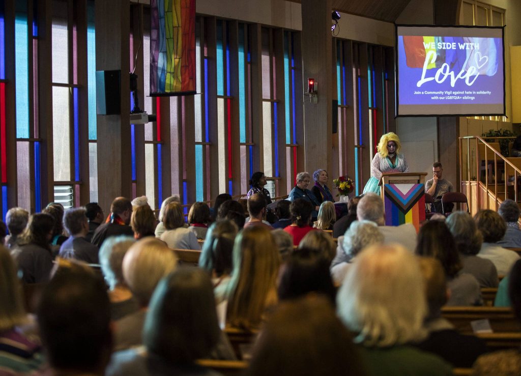 Artist and poet Luna DeLete reads a poem during the vigil held at Edmonds United Methodist Church on Tuesday, May 2, 2023 in Edmonds, Washington. (Olivia Vanni / The Herald)
