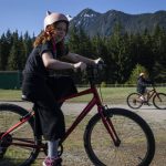 Students ride around on their bikes before the start of bike safety class at Darrington Elementary School on Friday, May 12, 2023 in Darrington, Washington. (Olivia Vanni / The Herald)