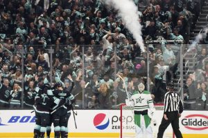 Dallas Stars goaltender Jake Oettinger looks on as the Seattle Kraken celebrate a goal during the second period of Game 3 of an NHL hockey Stanley Cup second-round playoff series Sunday, May 7, 2023, in Seattle. (AP Photo/Lindsey Wasson)