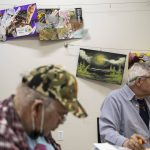 Artwork hangs on the walls in the art studio at the Everett Recovery Cafe on Wednesday, May 10, 2023 in Everett, Washington. (Olivia Vanni / The Herald)