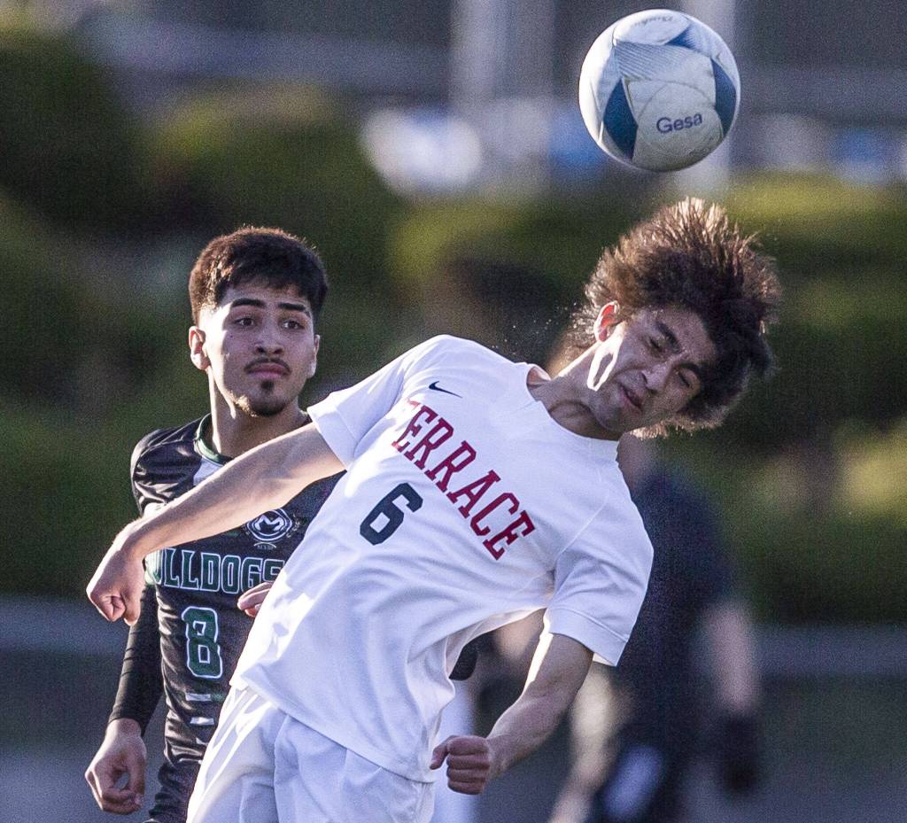 Mountlake Terraces Job Astudillo heads the ball during the game against Mount Vernon on Tuesday, May 9, 2023 in Shoreline, Washington. (Olivia Vanni / The Herald)