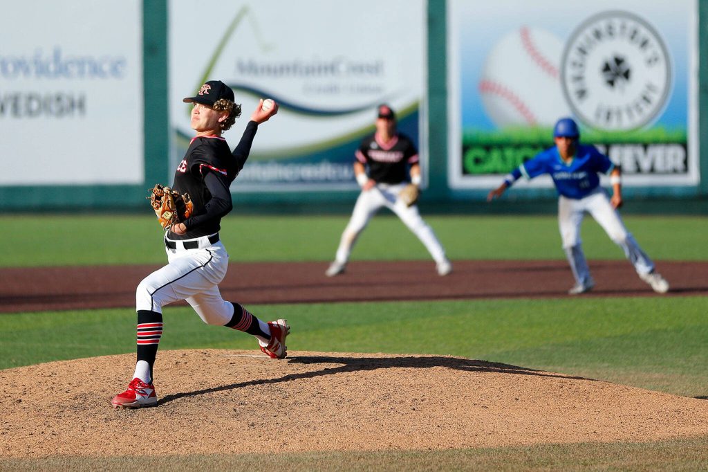 Mountlake Terraces Robert Swan delivers a pitch with the tying run on second against Shorewood in a Wesco 3A District 1 semifinal on Tuesday, May 9, 2023, at Funko Field in Everett, Washington. (Ryan Berry / The Herald)