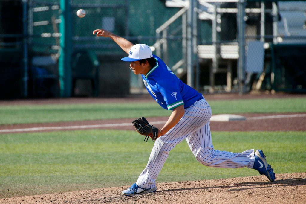 Shorewood pitcher Jacob Lindberg delivers to home against Mountlake Terrace in a Wesco 3A District 1 semifinal on Tuesday, May 9, 2023, at Funko Field in Everett, Washington. (Ryan Berry / The Herald)