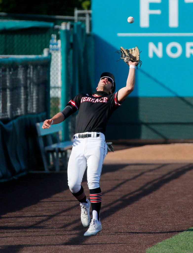 Mountlake Terraces Bede Bresee catches a foul popup against Shorewood in a Wesco 3A District 1 semifinal on Tuesday, May 9, 2023, at Funko Field in Everett, Washington. (Ryan Berry / The Herald)