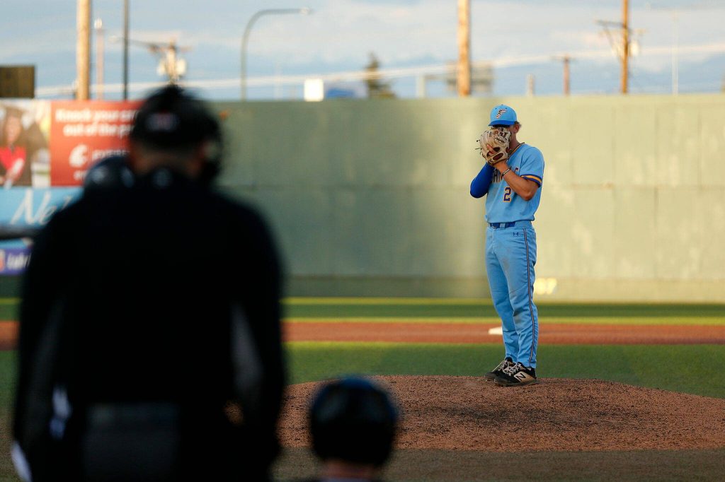 Ferndales Dylan Strom stares down to home before dealing a pitch against Edmonds-Woodway in a Wesco 3A District 1 semifinal on Tuesday, May 9, 2023, at Funko Field in Everett, Washington. (Ryan Berry / The Herald)