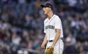 Seattle Mariners starting pitcher George Kirby walks off the field after the top of the seventh inning of the team's baseball game against the Texas Rangers, Tuesday, May 9, 2023, in Seattle. (AP Photo/Stephen Brashear)