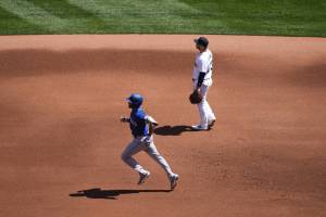Seattle Mariners first baseman Ty France, rear, looks away as Texas Rangers' Marcus Semien runs the bases after hitting a solo home run during the third inning of a baseball game Wednesday, May 10, 2023, in Seattle. (AP Photo/Lindsey Wasson)