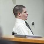 Shayne Baker listens to Carrie Jenks testimony during his trial at the Snohomish County Courthouse on Tuesday, May 2, 2023 in Everett, Washington. (Olivia Vanni / The Herald)
