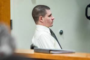 Shayne Baker listens to Carrie Jenks' testimony during his trial at the Snohomish County Courthouse on Tuesday, May 2, 2023 in Everett, Washington. (Olivia Vanni / The Herald)