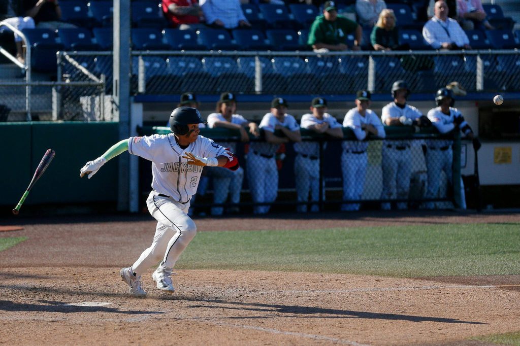 Jacksons Micah Coleman lays down a bunt against Lake Stevens during a Wesco 4A District 1/2 game on Thursday, May 11, 2023, at Funko Field in Everett, Washington. (Ryan Berry / The Herald)