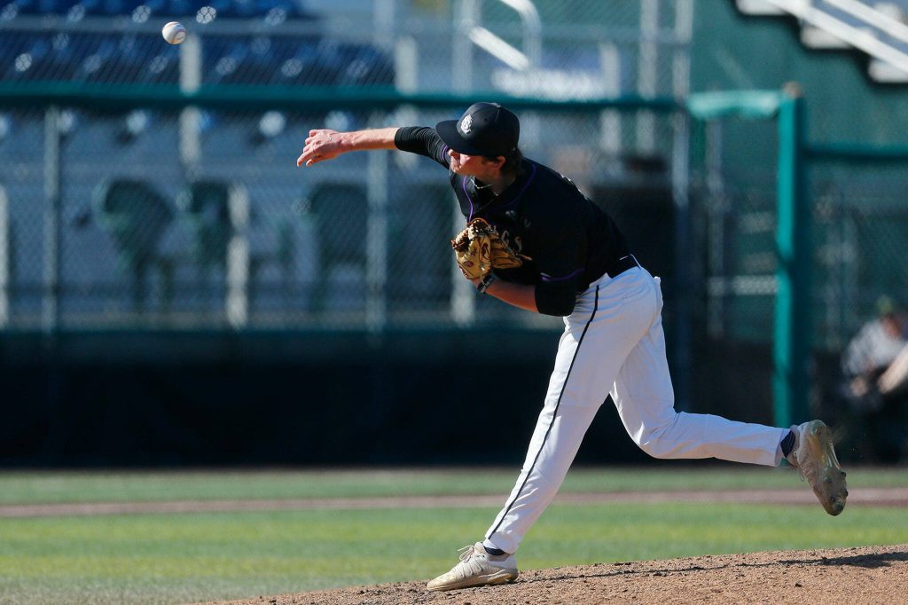 Lake Stevens Wyatt Queen delivers a pitch against Jackson during a Wesco 4A District 1/2 game on Thursday, May 11, 2023, at Funko Field in Everett, Washington. (Ryan Berry / The Herald)