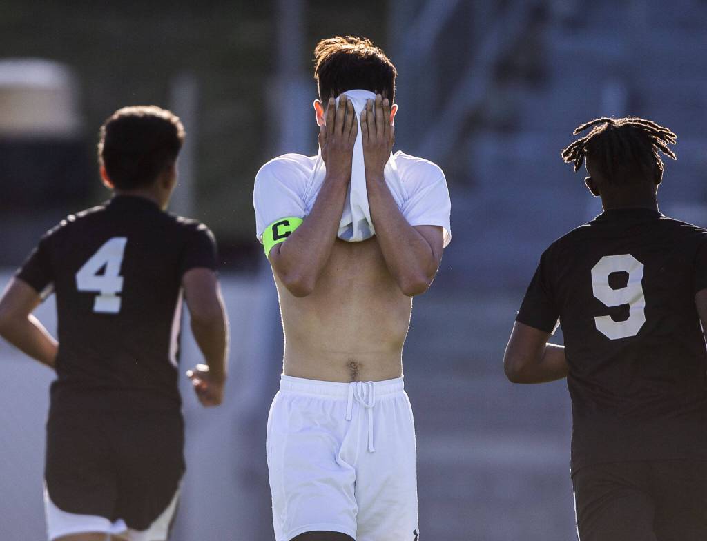 Bothells Brock Larsen reacts to a second goal scored by Jackon during the game on Thursday, May 11, 2023 in Everett, Washington. (Olivia Vanni / The Herald)