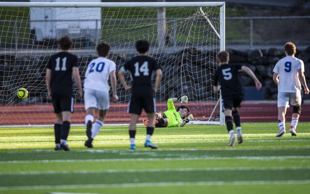 Jackson goalie Ben Ferguson misses a penalty shot by Bothells Myles Nafe during the game on Thursday, May 11, 2023 in Everett, Washington. (Olivia Vanni / The Herald)