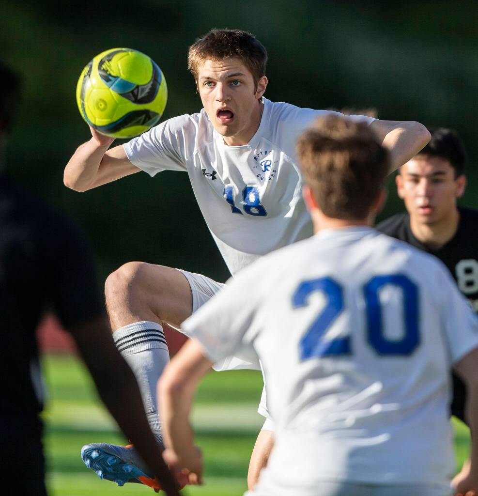 Bothells Samuel Winkelman traps the ball during the game against Jackson on Thursday, May 11, 2023 in Everett, Washington. (Olivia Vanni / The Herald)