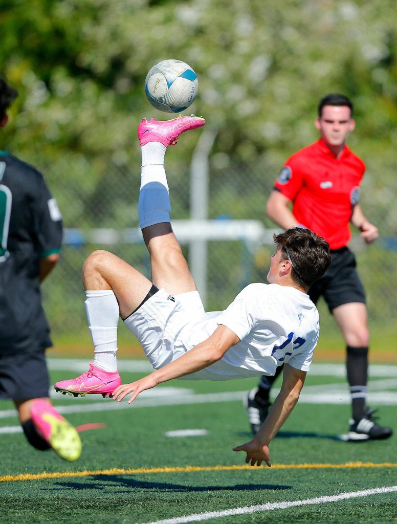 Shorewoods Ilya Mohav bicycles the ball back towards the opposing goal against Mount Vernon during the 3A District Championship match on Saturday, May 13, 2023, at Shoreline Stadium in Shoreline, Washington. (Ryan Berry / The Herald)