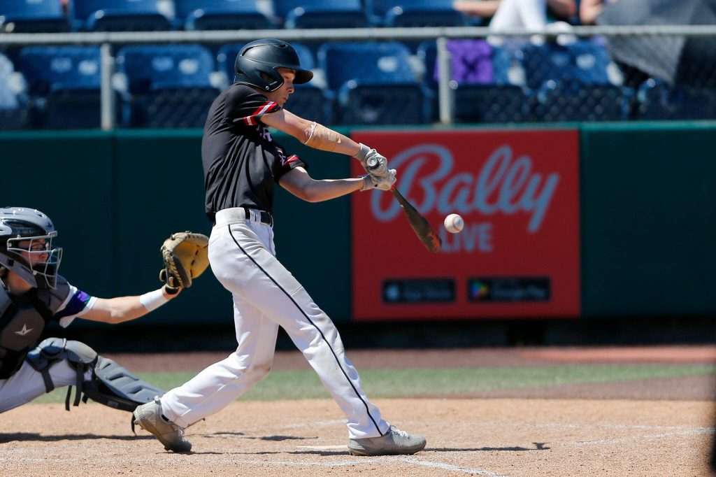 Mountlake Terraces Ryan Sturgill hits a single against Edmonds-Woodway in the 3A District title game on Saturday, May 13, 2023, at Funko Field in Everett, Washington. (Ryan Berry / The Herald)