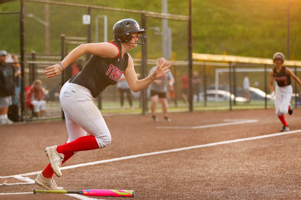 Mountlake Terraces Kaylee Mitchell heads out of the batters box on a go-ahead 2-run single in extra innings against Cascade during the Class 3A District 1 softball tournament Tuesday, May 16, 2023, at the Phil Johnson Ballfields in Everett, Washington. (Ryan Berry / The Herald)