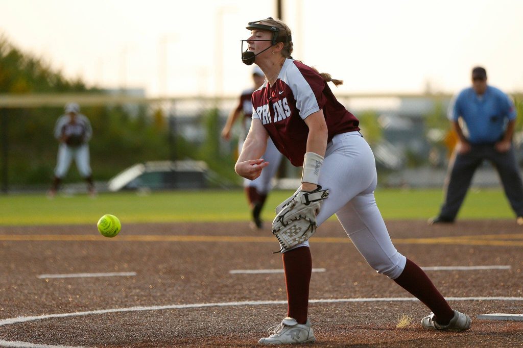 Cascades Alexa Hamshaw works with a runner on in extra innings against Mountlake Terrace during the Class 3A District 1 softball tournament Tuesday, May 16, 2023, at the Phil Johnson Ballfields in Everett, Washington. (Ryan Berry / The Herald)
