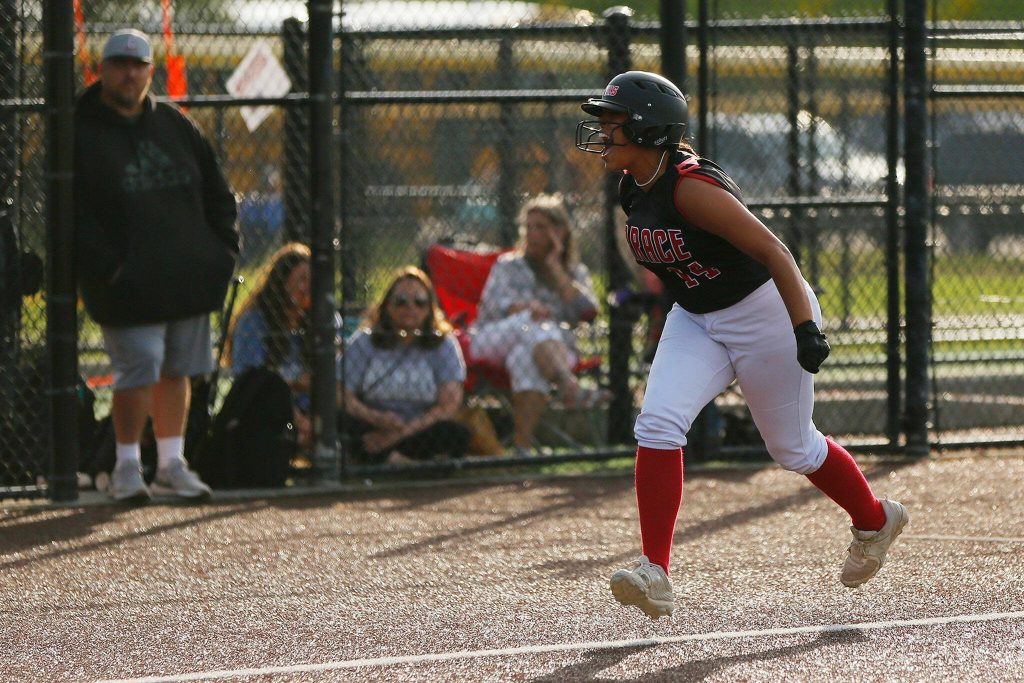 Mountlake Terraces Mya Sheffield lets out a shout after rounding third on homer against Cascade during the Class 3A District 1 softball tournament Tuesday, May 16, 2023, at the Phil Johnson Ballfields in Everett, Washington. (Ryan Berry / The Herald)