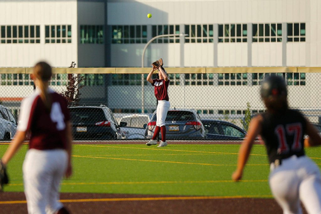 Cascades Sophia Tripp camps under a fly ball to end the inning against Mountlake Terrace during the Class 3A District 1 softball tournament Tuesday, May 16, 2023, at the Phil Johnson Ballfields in Everett, Washington. (Ryan Berry / The Herald)