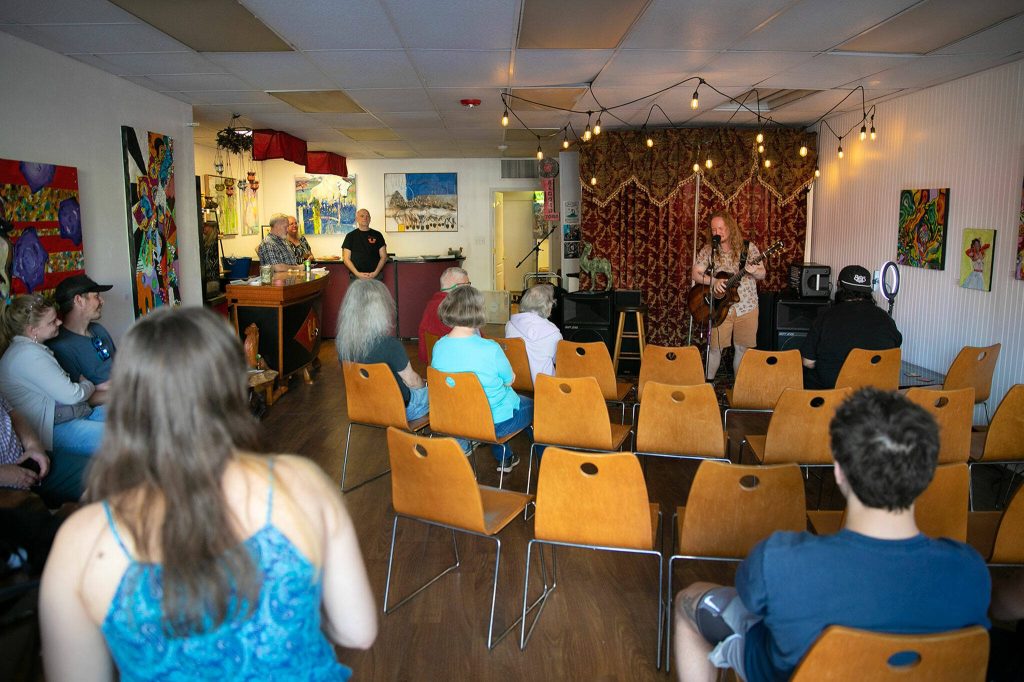 Ben West closes out his set at Zamarama Gallery during the opening night of Fishermans Village on Thursday, May 18, 2023, at in downtown Everett, Washington. (Ryan Berry / The Herald)