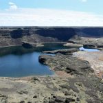 A view of Dry Falls from the catwalk overlooking the 3.5-mile scalloped precipice  which 20,000 years ago was five times the width of Niagara Falls with 10 times the flow of all the current rivers in the world combined. (Dominick Bonny / Crosscut)