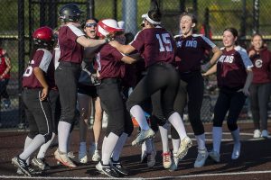 Cascade players celebrate during a game between Everett and Cascade at Phil Johnson Ballfields in Everett, Washington on Thursday, May 18, 2023. Cascade won in the ninth inning, 16-15. (Annie Barker / The Herald)