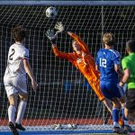 Shorewoods Conner Cann just misses a save during the game against Ballard on Thursday, May 18, 2023 in Shoreline, Washington. (Olivia Vanni / The Herald)