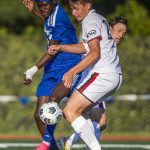 Shorewoods Anthony Henry battles for the ball during the game against Ballard on Thursday, May 18, 2023 in Shoreline, Washington. (Olivia Vanni / The Herald)